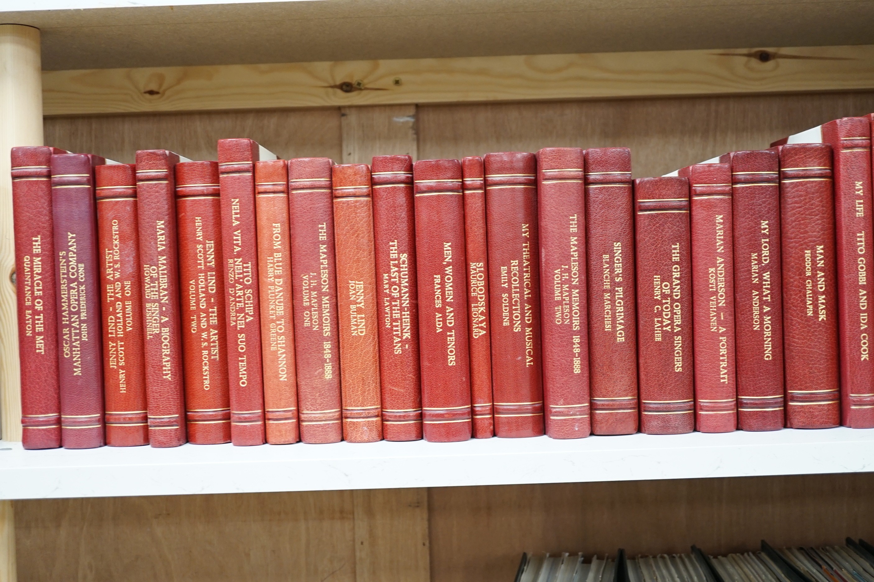 A collection of 19th and 20th century works on opera related biographies, autobiographies and histories, bound in red morocco by EA Weeks, London, one signed by the author, approx. 69 in total. Please note :- A SIMILAR L